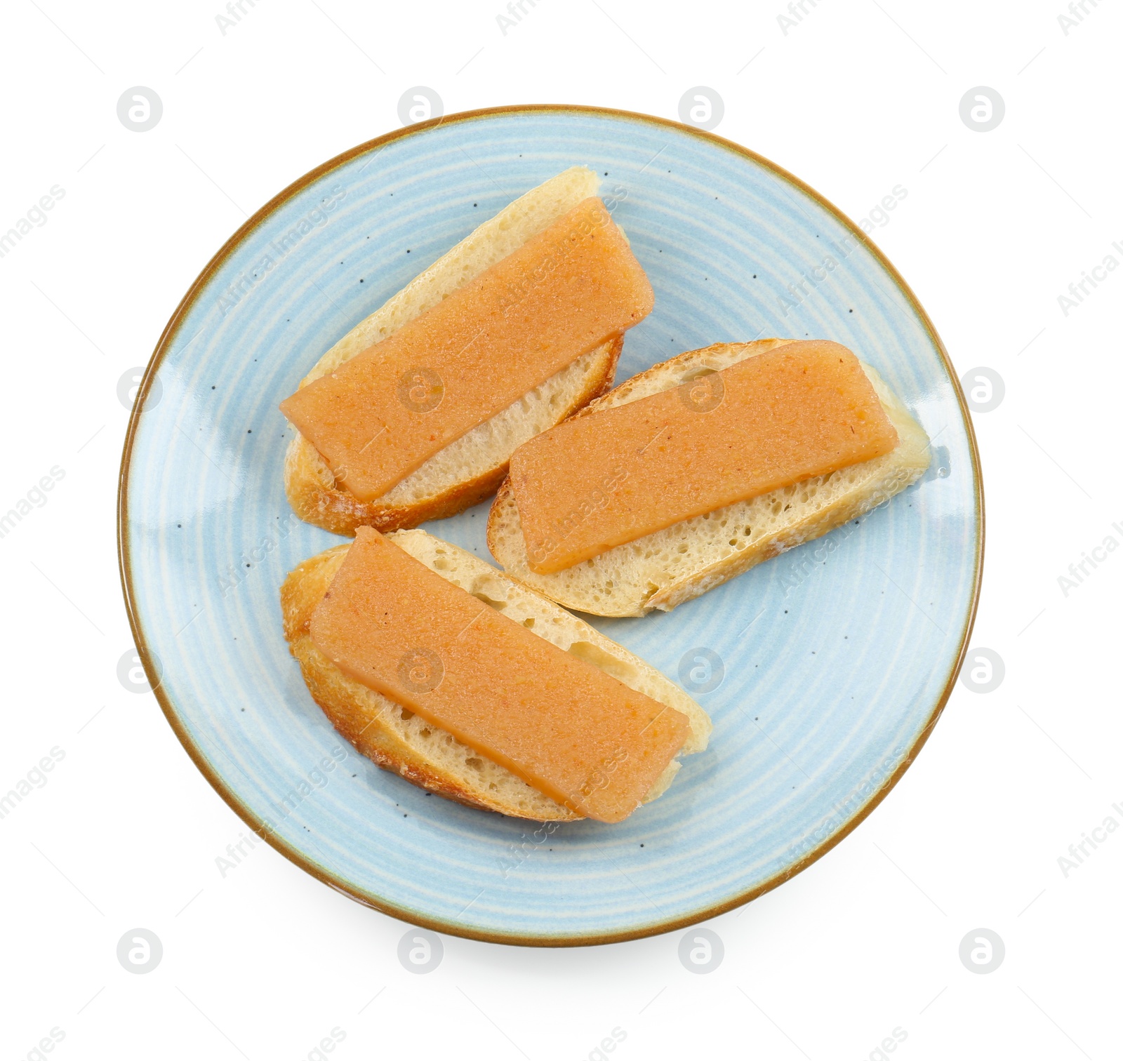 Photo of Bread with delicious sweet quince paste isolated on white