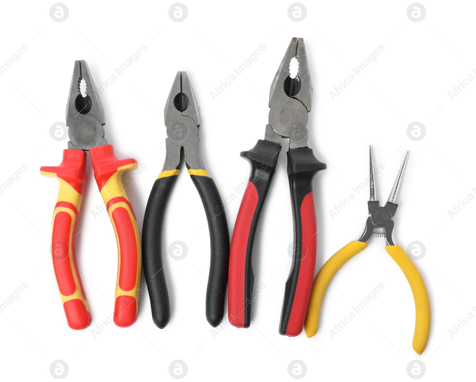 Photo of Group of different pliers isolated on white, top view