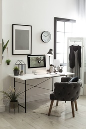 Photo of Stylish workplace with modern computer on desk