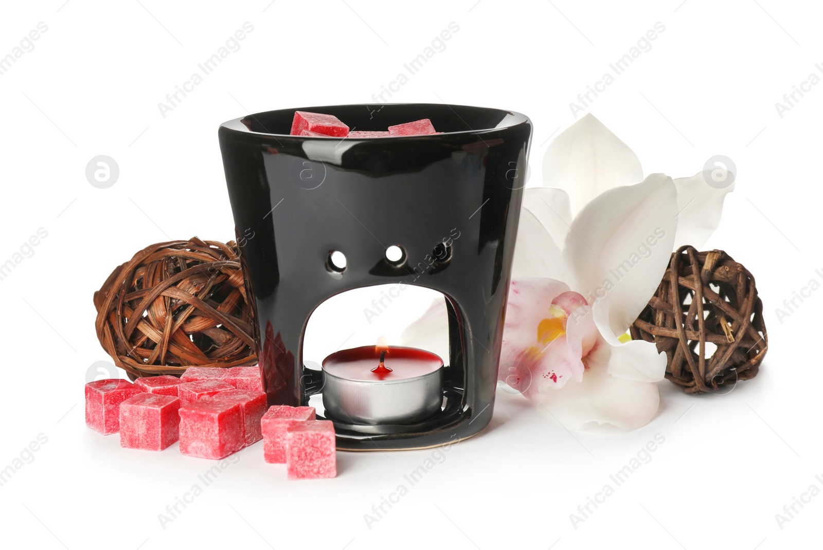 Photo of Stylish aroma lamp with essential wax cubes and flower on white background