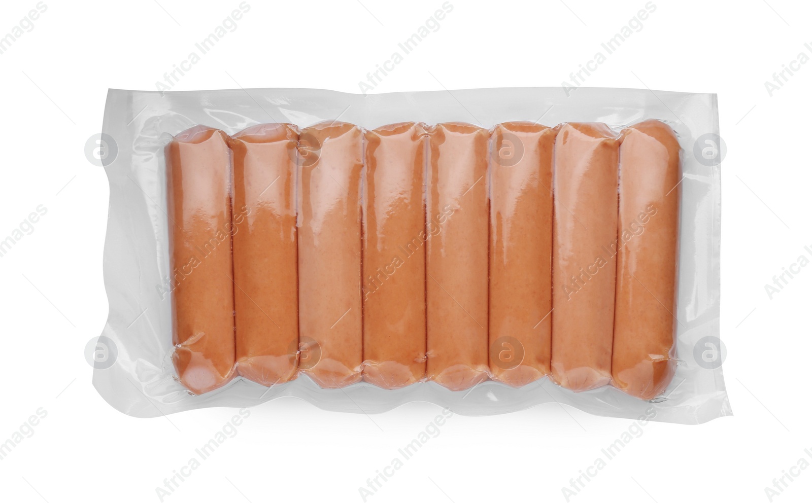 Photo of Vacuum pack with sausages isolated on white, top view. Meat product