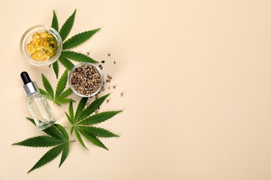 Flat lay composition with hemp leaves, CBD oil and THC tincture on beige background, space for text