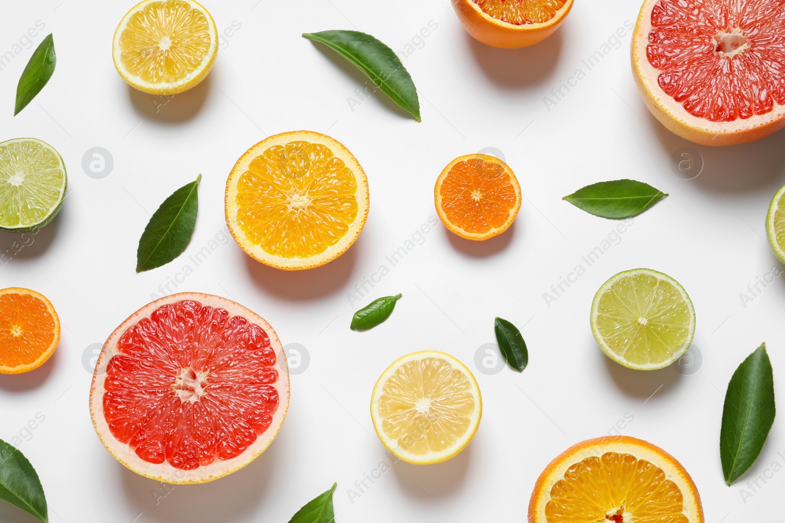 Photo of Flat lay composition with different citrus fruits on white background