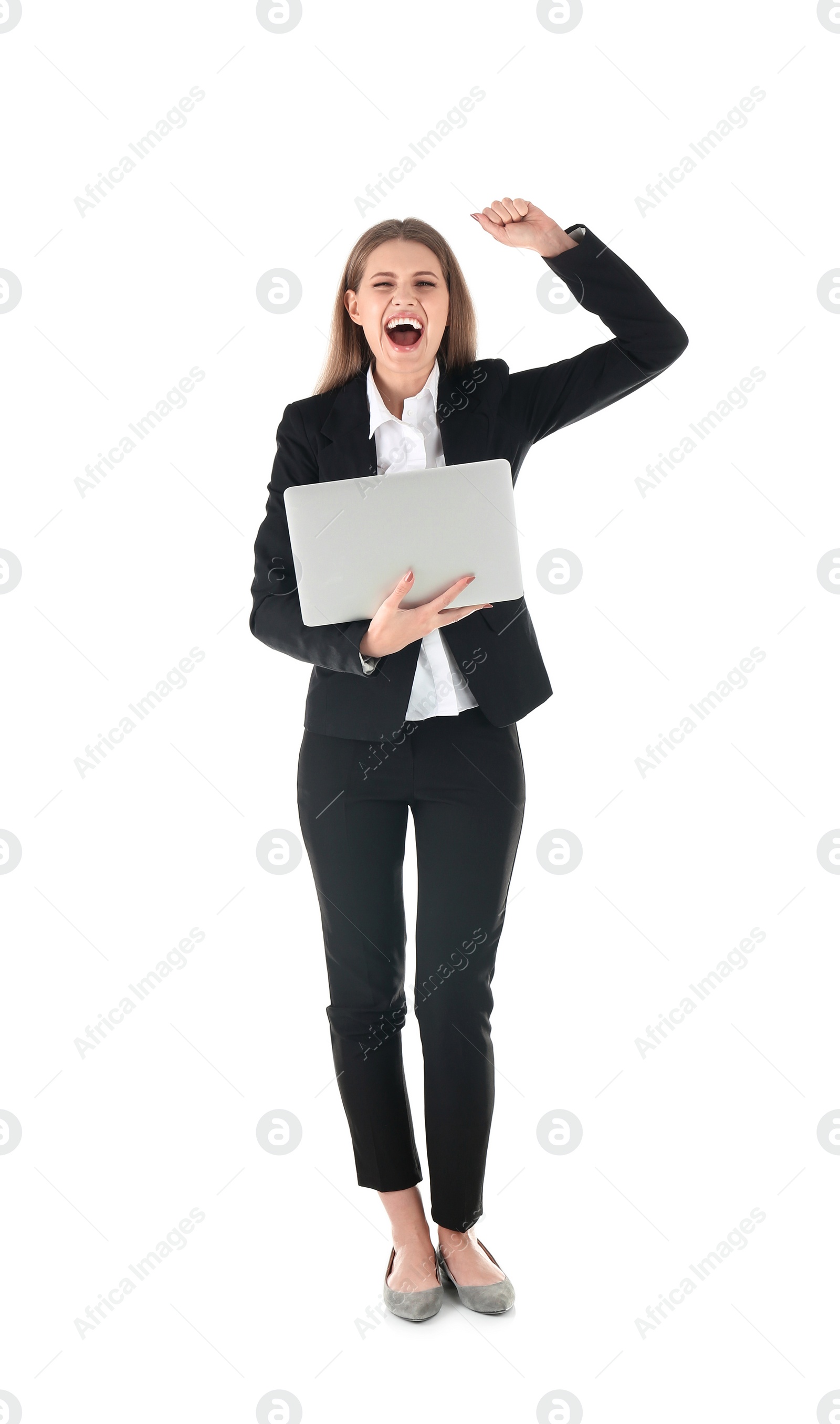 Photo of Emotional businesswoman in office wear with laptop celebrating victory on white background