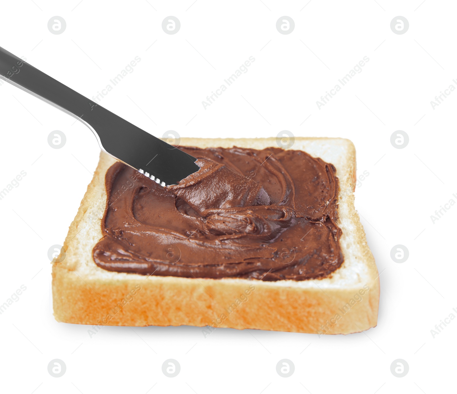 Photo of Spreading sweet chocolate paste onto toast on white background