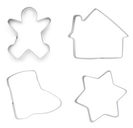 Image of Set with cookie cutters of different shapes on white background