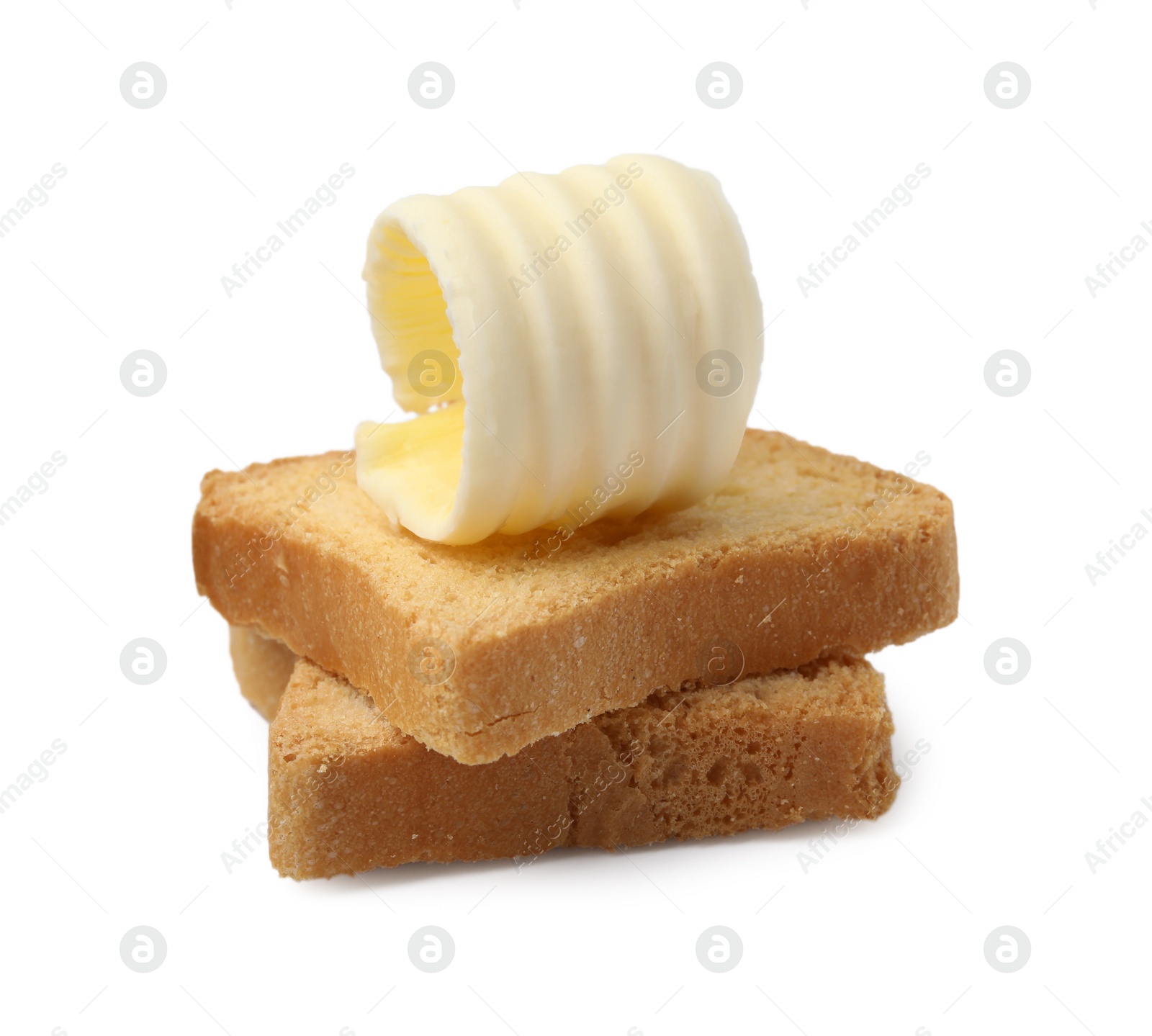 Photo of Tasty butter curl and pieces of dry bread isolated on white