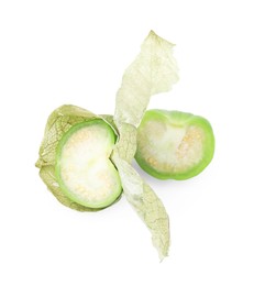 Photo of Fresh green tomatillos with husk isolated on white, top view