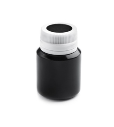 Photo of Jar with black paint on white background. Artistic equipment for children