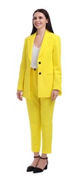 Photo of Beautiful happy businesswoman in yellow suit on white background