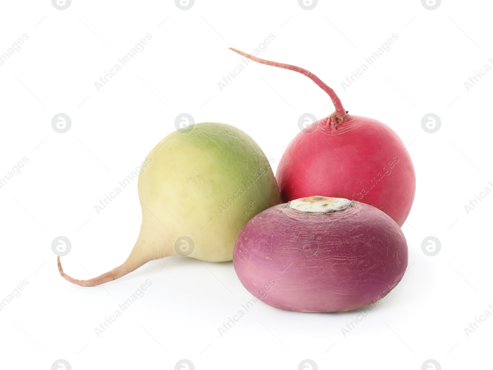 Photo of Different fresh ripe turnips on white background