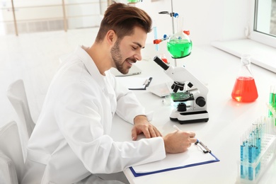 Photo of Medical student working in modern scientific laboratory