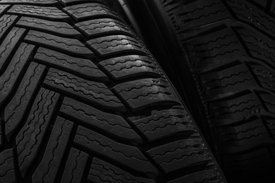 Wheels with winter tires as background, closeup