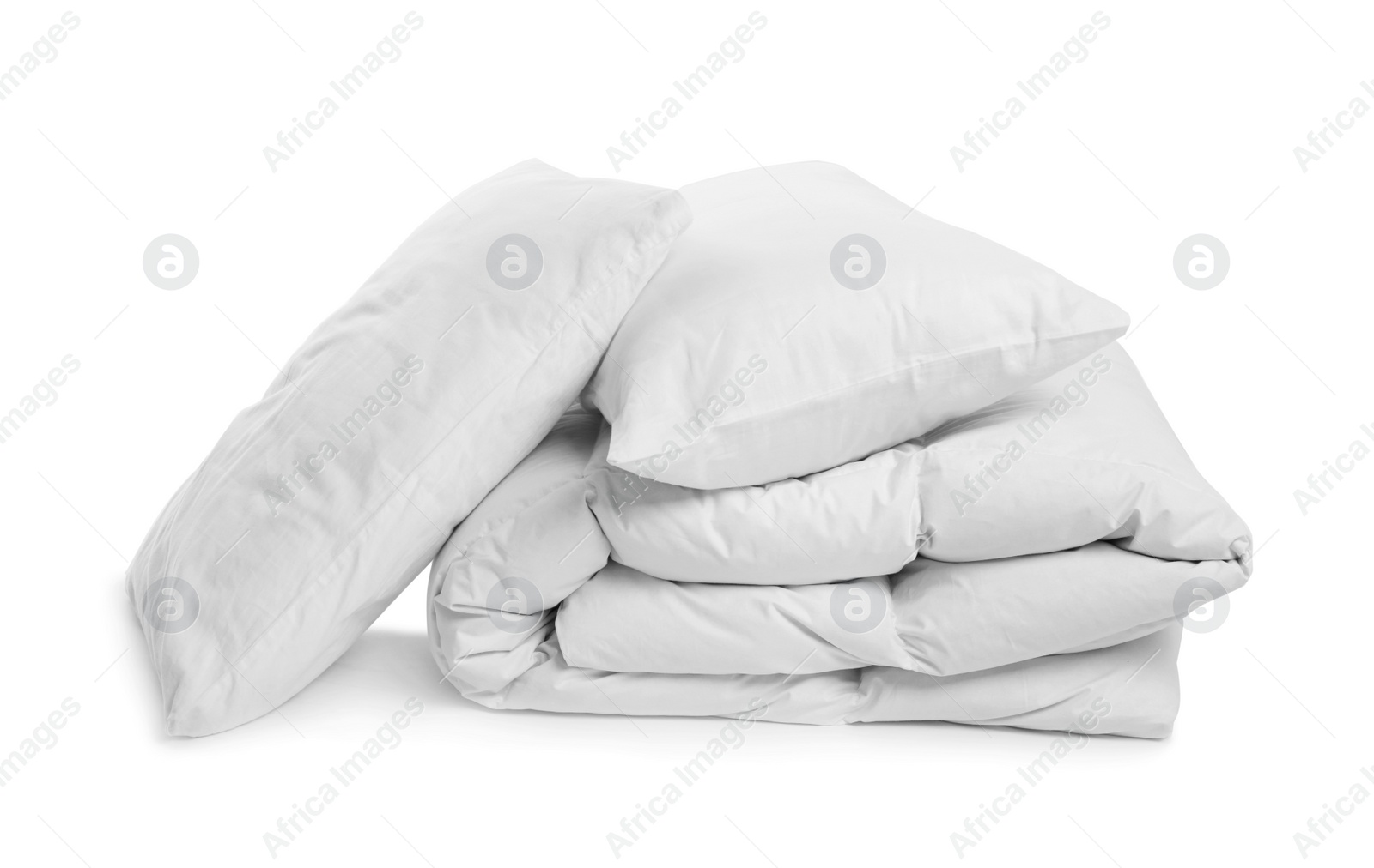 Photo of Clean blanket and pillows on white background