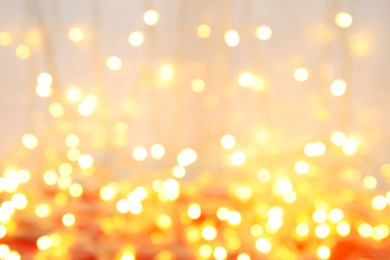 Blurred view of beautiful Christmas lights. Festive background