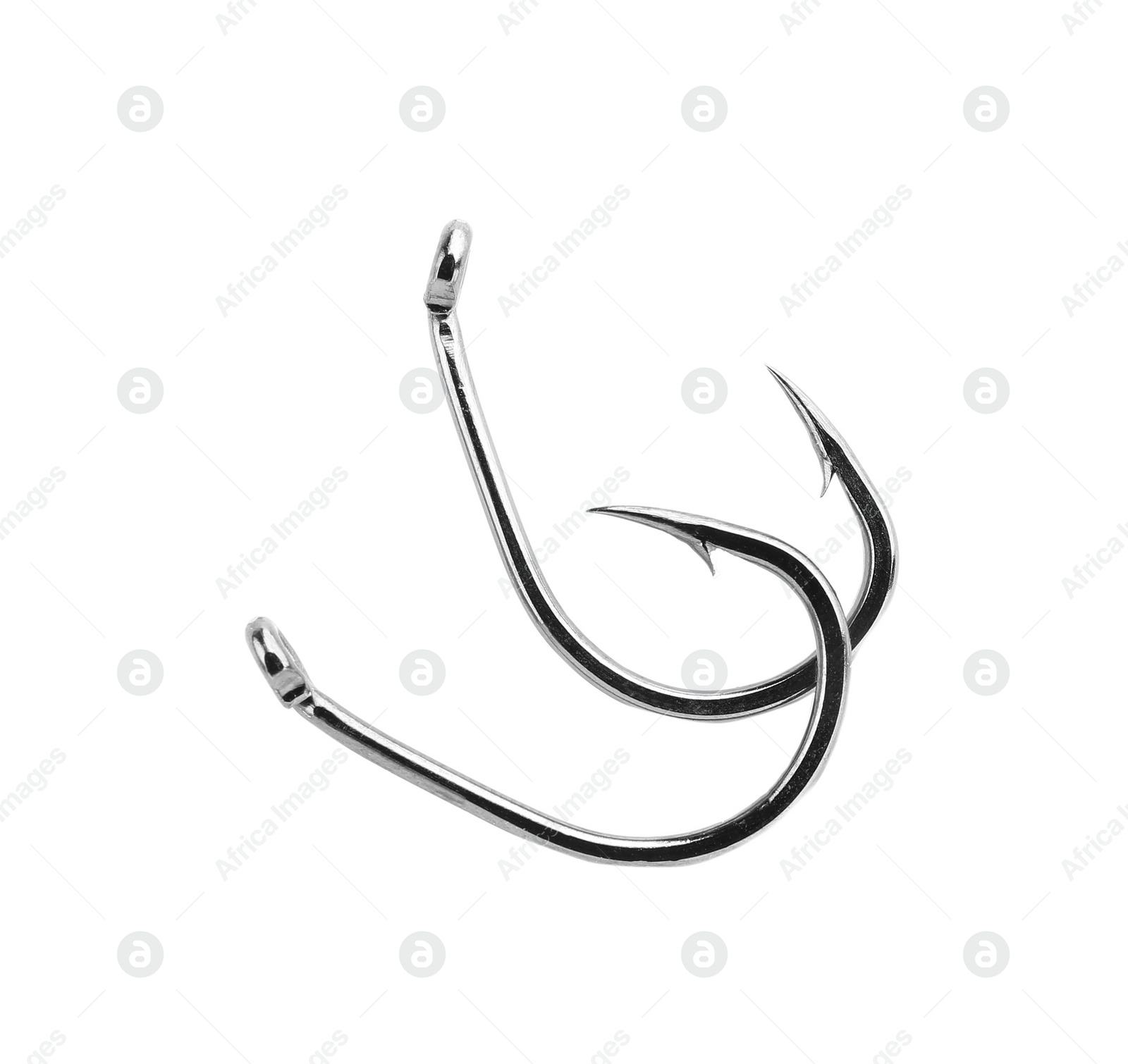 Photo of Metal hooks on white background. Fishing accessories