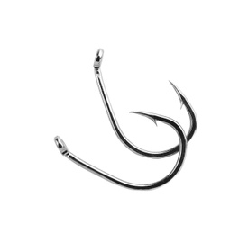 Photo of Metal hooks on white background. Fishing accessories