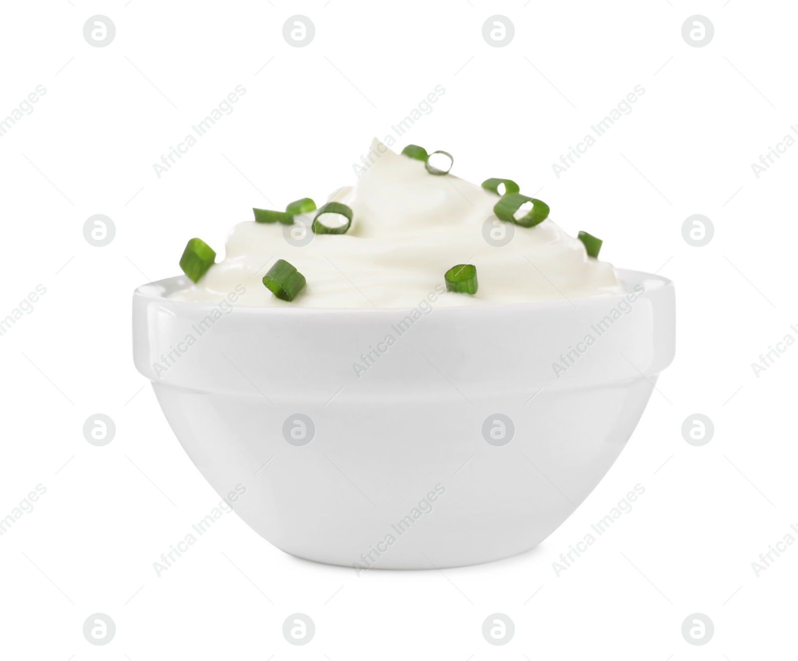 Photo of Delicious sour cream with onion in bowl on white background