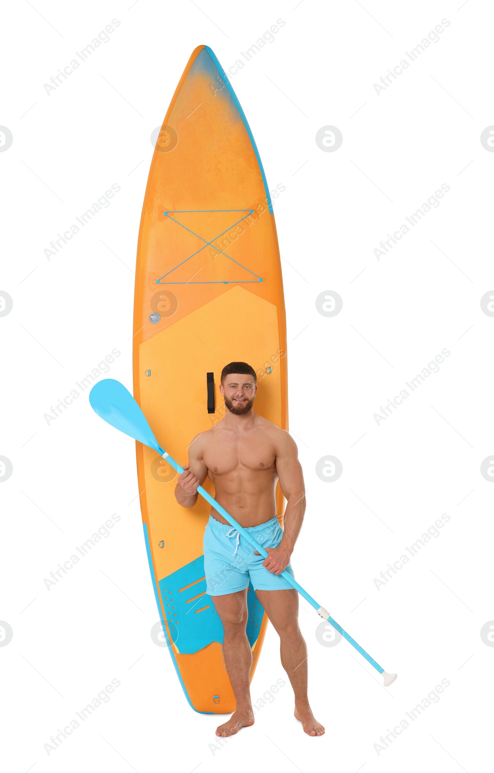 Photo of Happy man with orange SUP board and paddle on white background