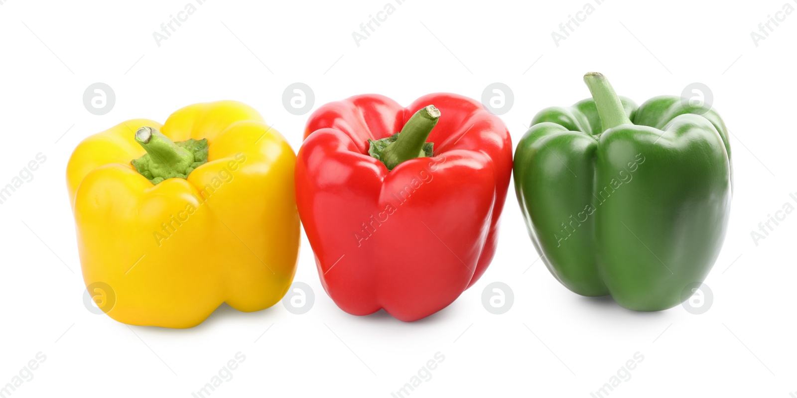 Photo of Fresh ripe colorful bell peppers isolated on white
