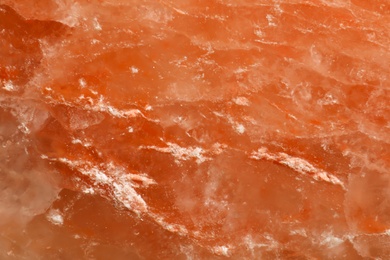 Orange Himalayan sea salt texture, closeup view