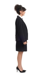 Young businesswoman in suit standing on white background