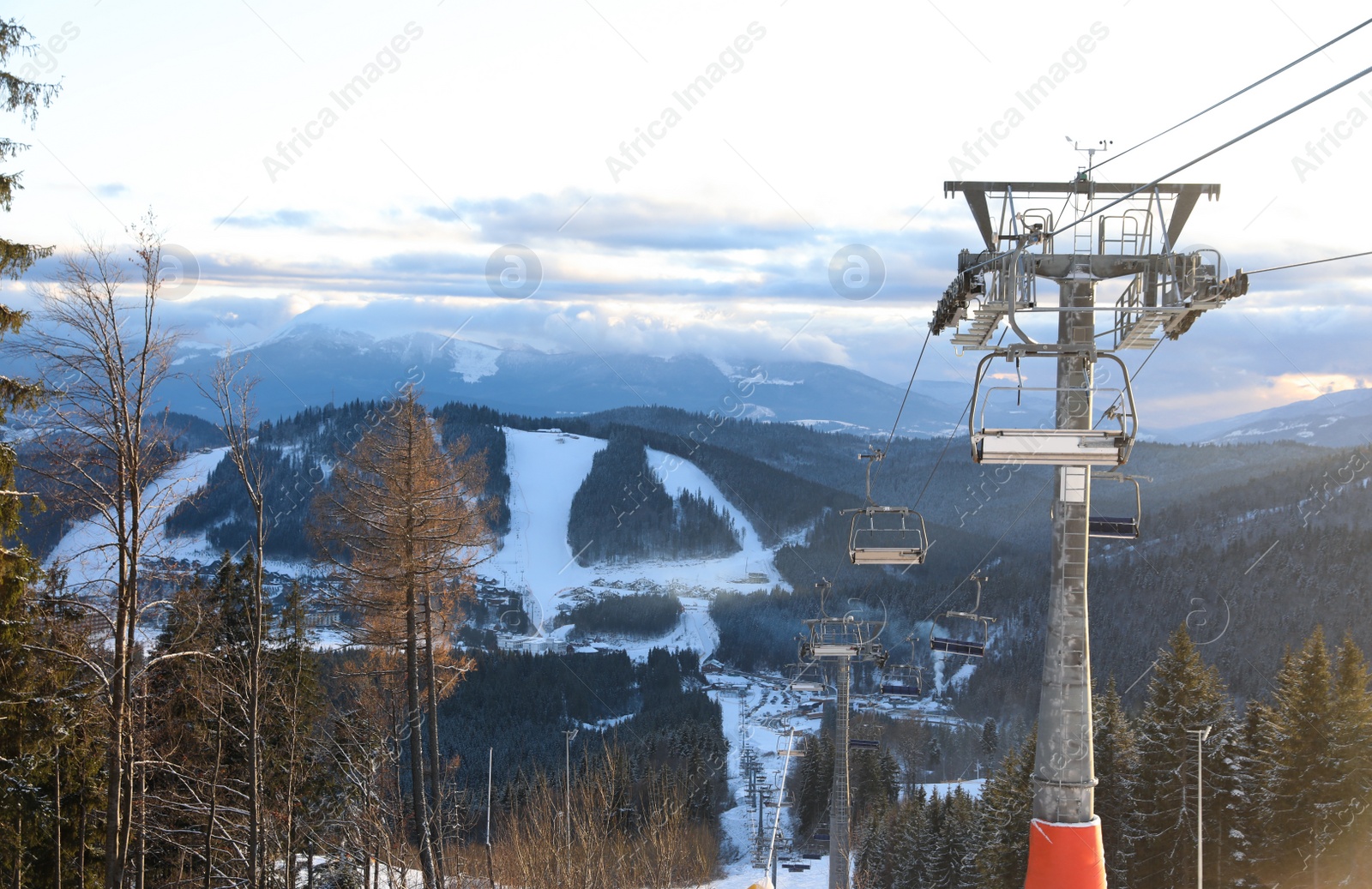 Photo of Beautiful mountain landscape with chairlift. Winter vacation