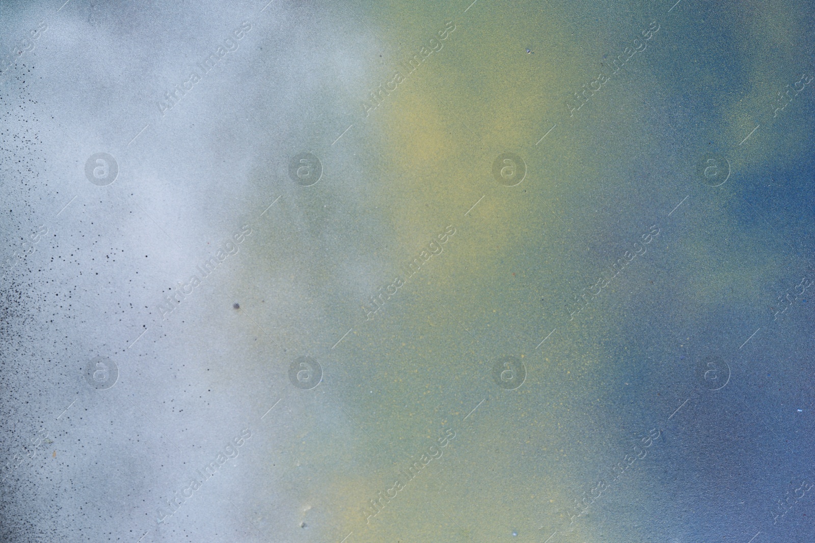 Photo of Texture of abstract spray paint as background, top view