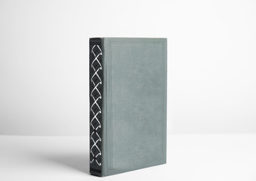 Photo of Hardcover book on white background. Space for design