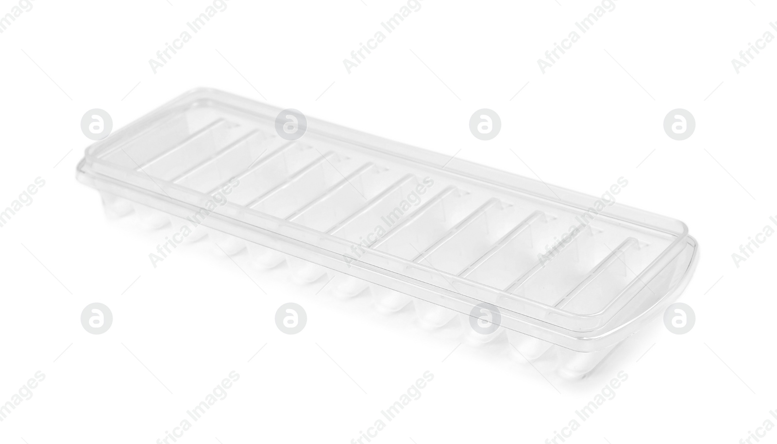 Photo of Empty ice cube tray on white background