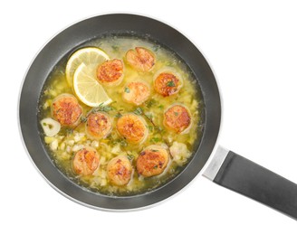 Photo of Delicious scallops with sauce in frying pan isolated on white, top view