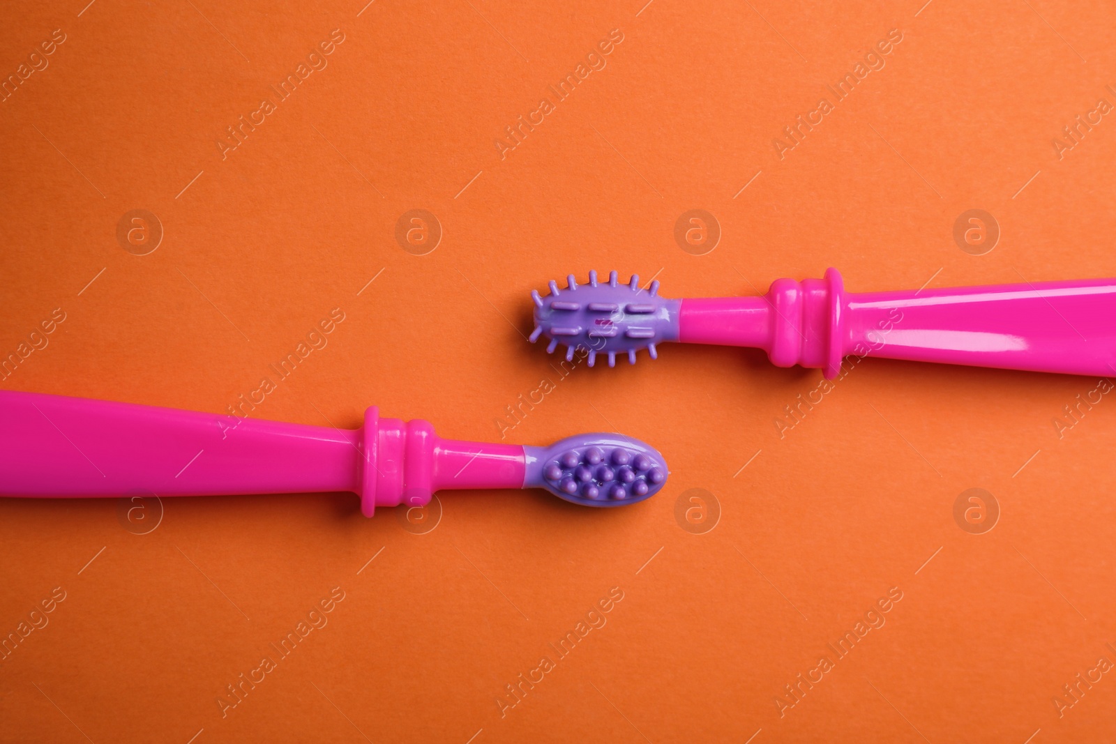 Photo of Manual toothbrushes for children on color background, top view