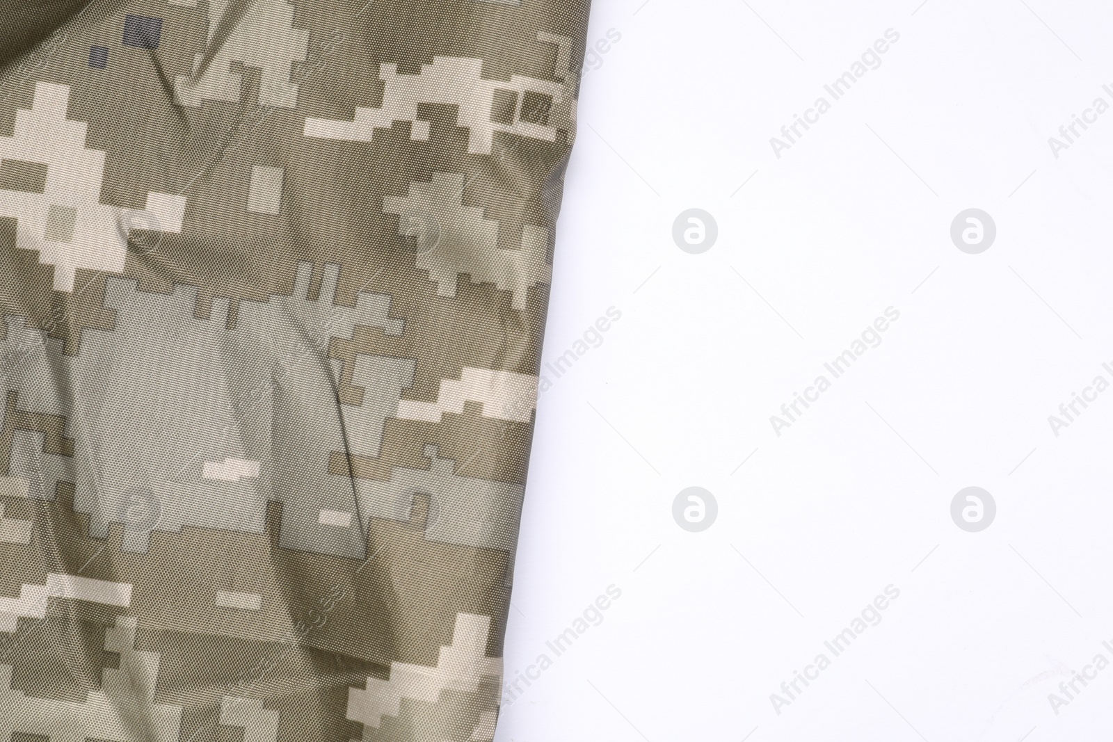 Photo of Camouflage fabric isolated on white, top view