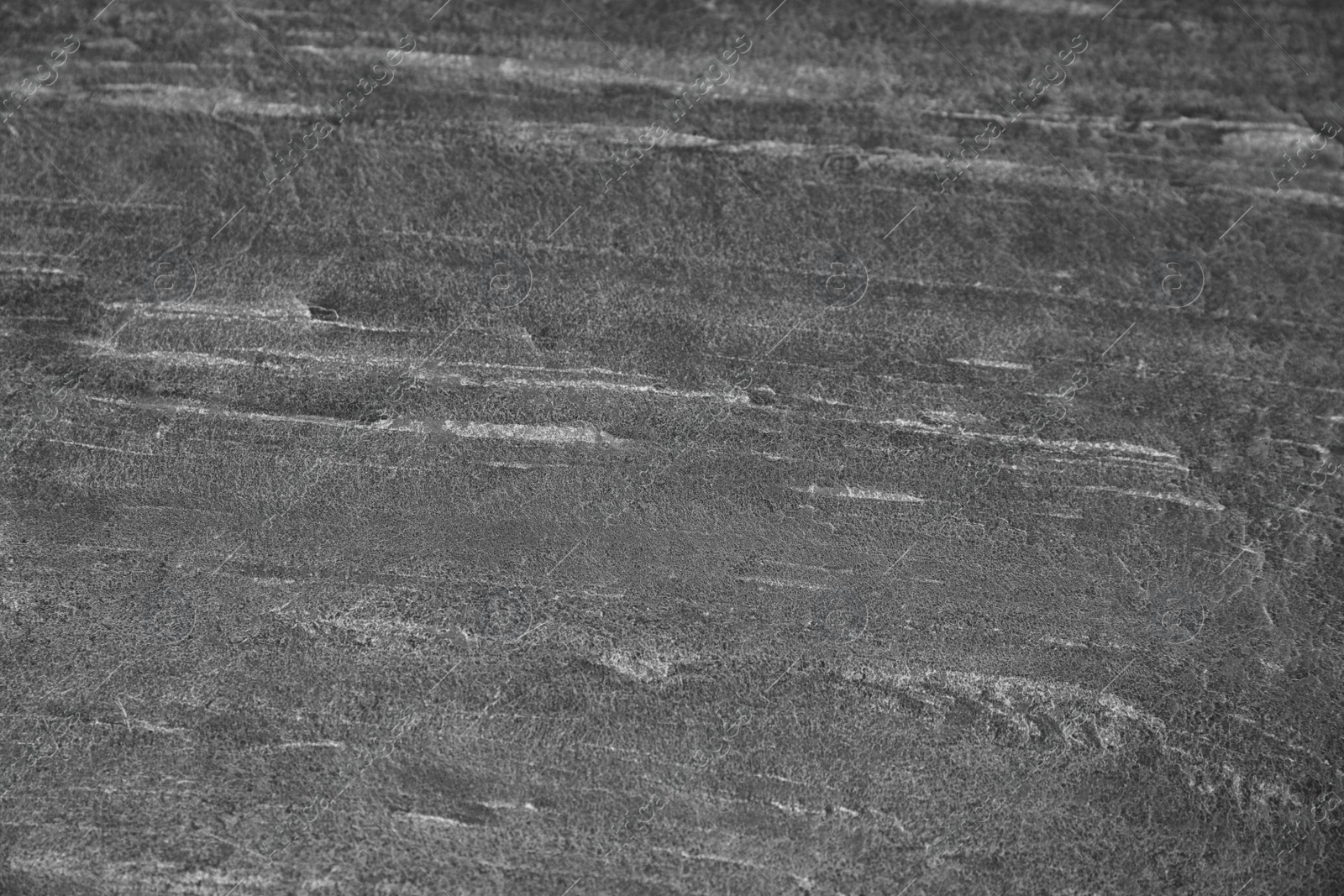 Photo of Texture of natural stone surface as background