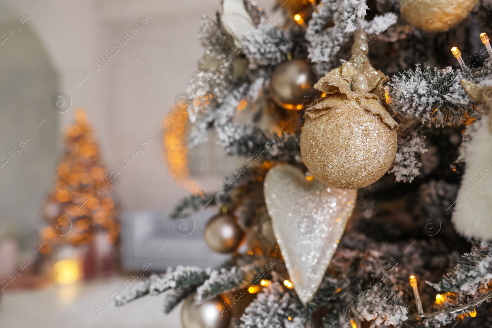 Photo of Beautiful Christmas tree in decorated living room interior, closeup