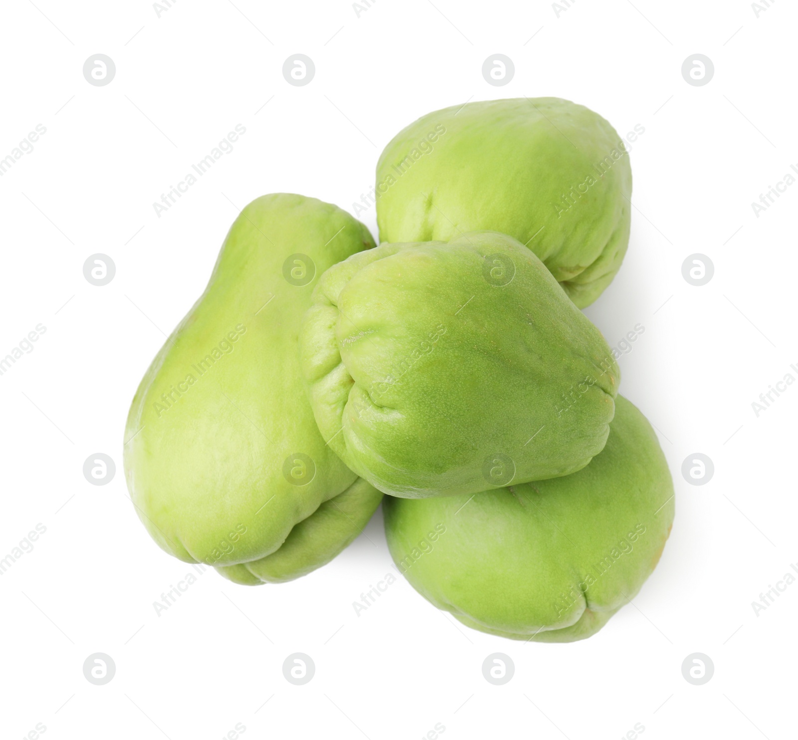 Photo of Many fresh green chayote isolated on white, top view