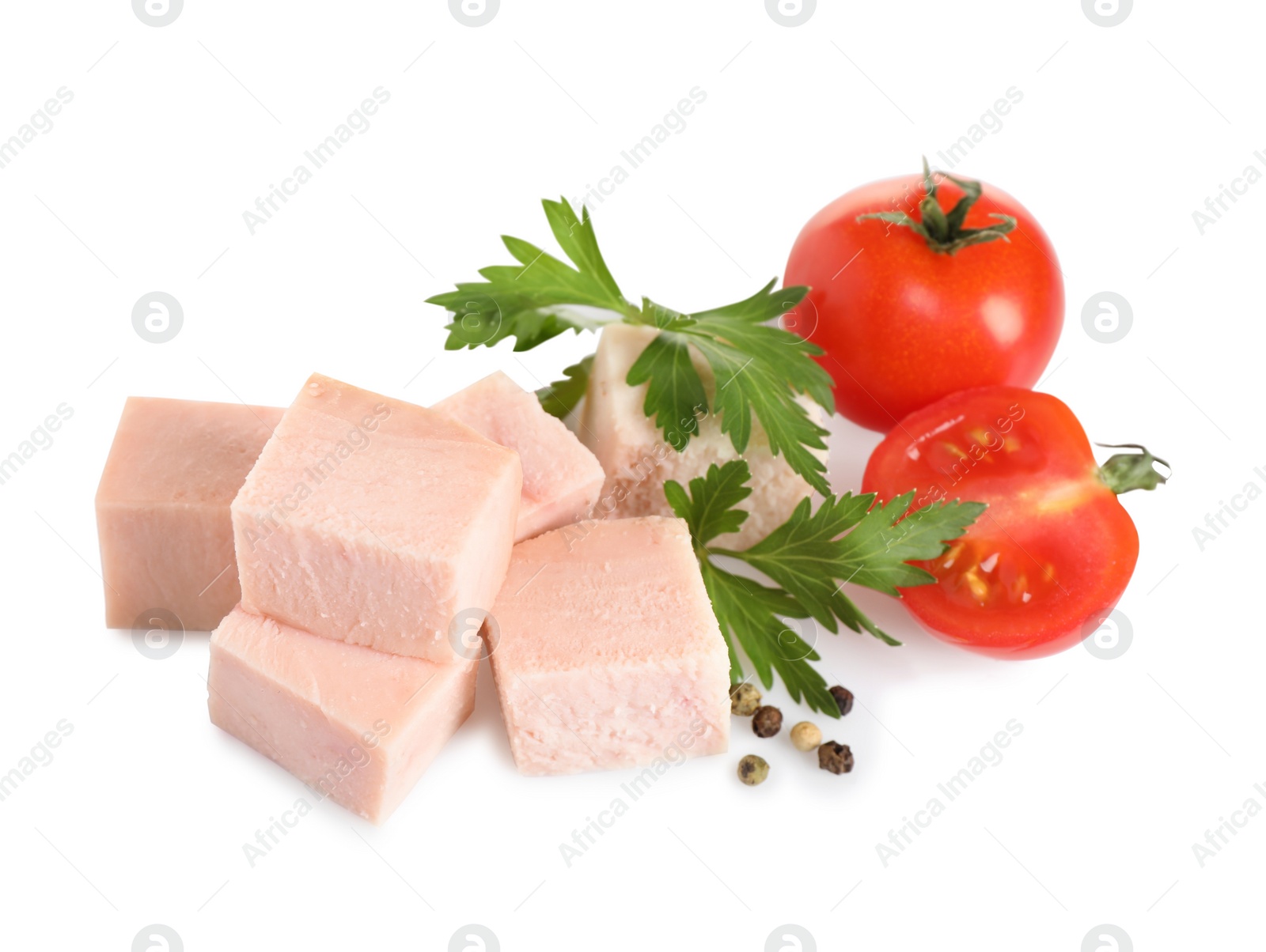 Photo of Tasty ham with cherry tomatoes, parsley and pepper isolated on white