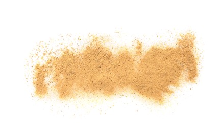 Photo of Brown dust scattered on white background, top view