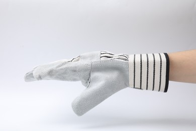 Photo of Woman in gardening glove on white background, closeup