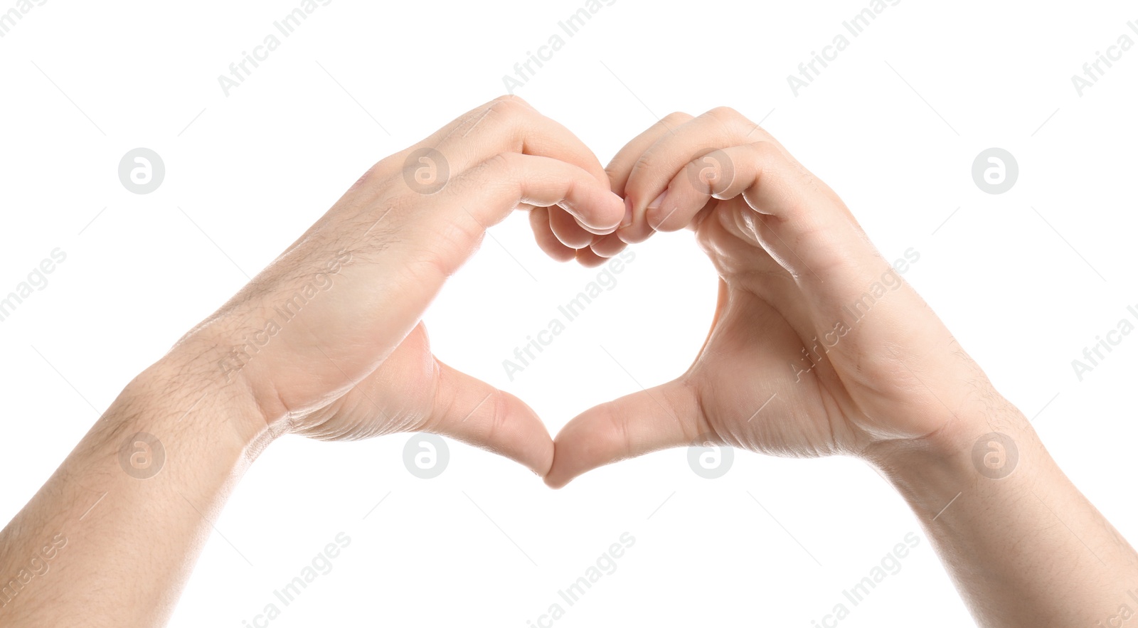 Photo of Young man making heart with his hands isolated on white, closeup