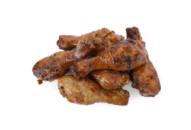 Photo of Pile of chicken legs glazed with soy sauce isolated on white, top view