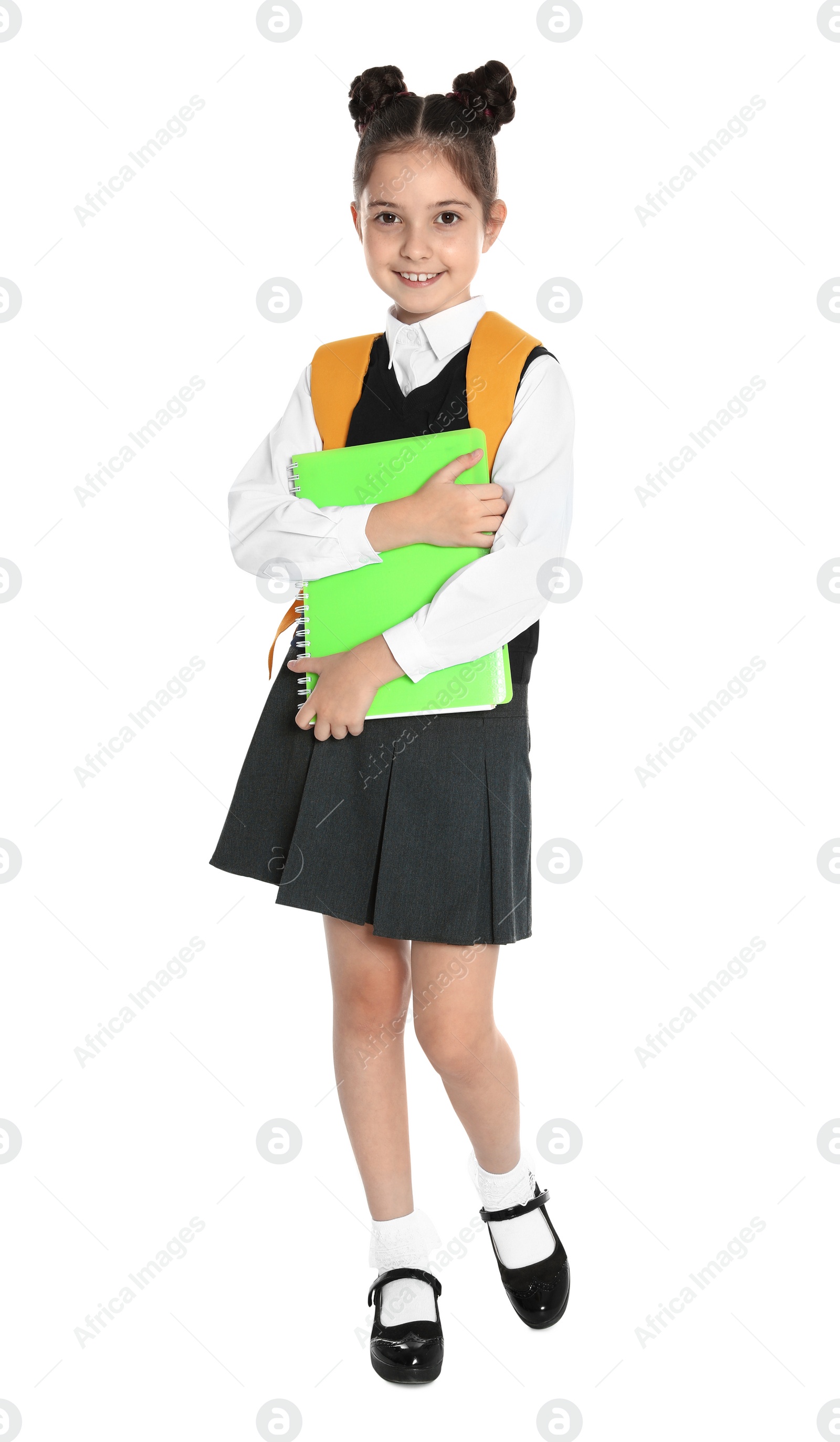 Photo of Happy girl in school uniform on white background