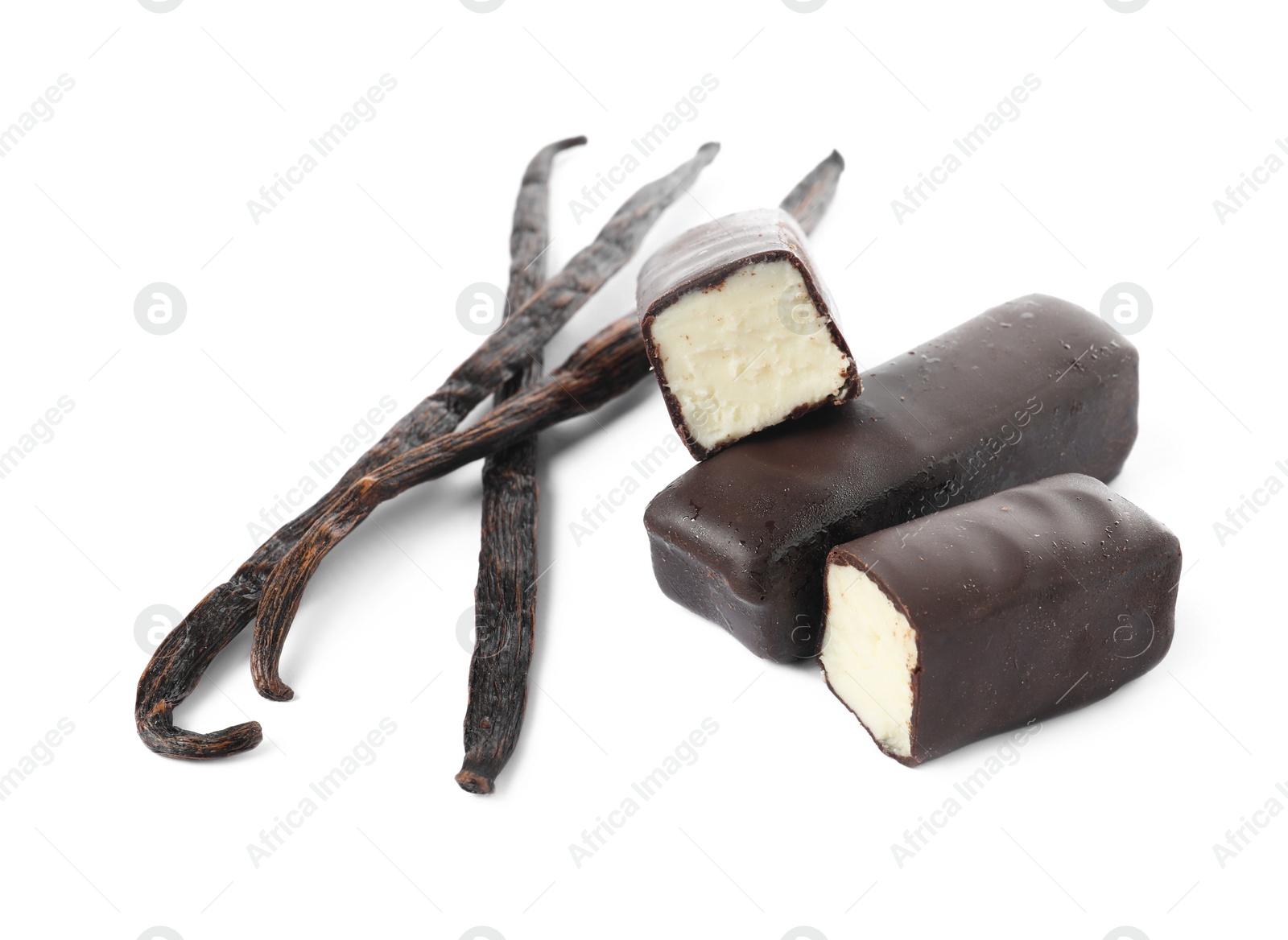 Photo of Glazed curd cheese bars and vanilla pods isolated on white