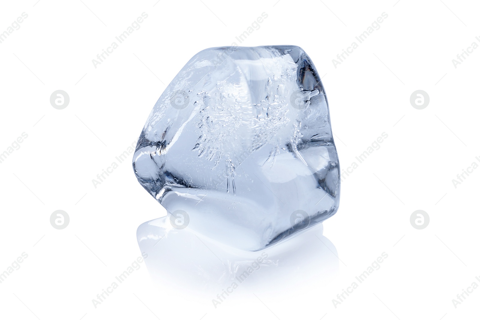 Photo of Piece of ice melting on white background