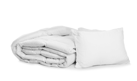 Photo of Clean blanket and pillows on white background