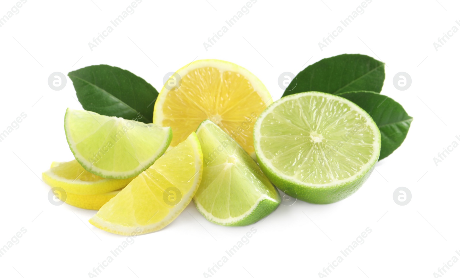 Photo of Cut fresh ripe lemon, lime and green leaves on white background