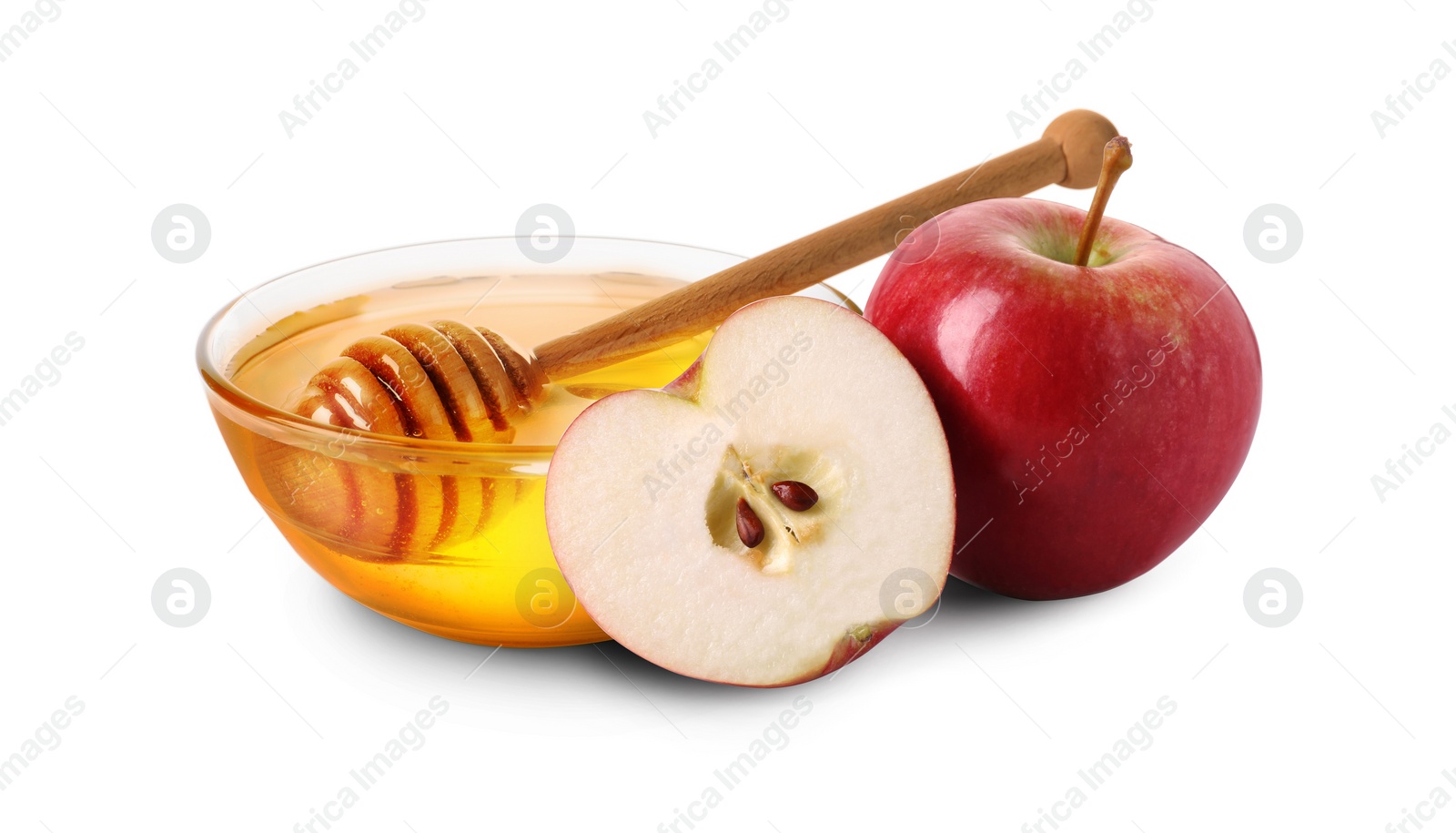 Image of Honey in bowl and apples isolated on white