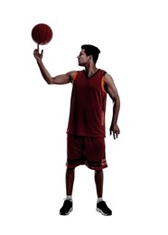 Image of Silhouette of basketball player spinning ball on finger against white background