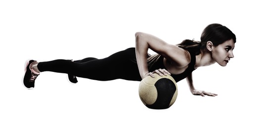 Image of Athletic woman doing exercise with medicine ball isolated on white