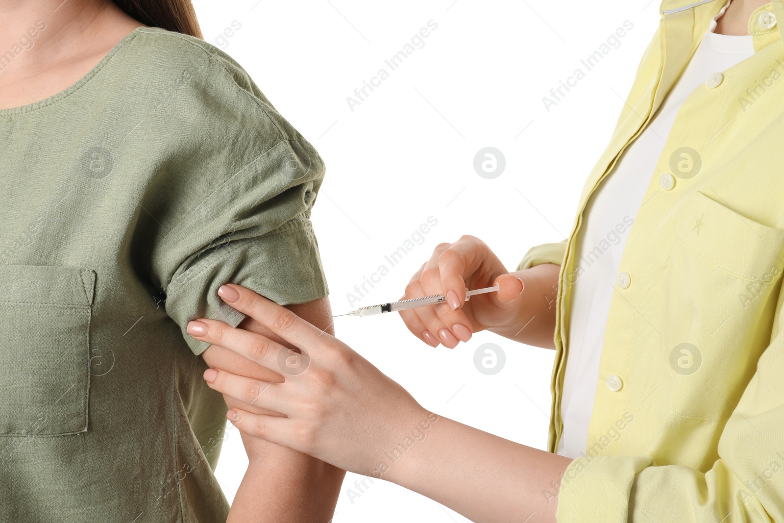 Photo of Diabetes. Woman getting insulin injection on white background, closeup